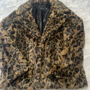 Tahari faux fur jacket . New